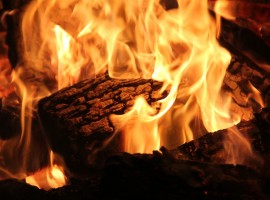 log on fire in wood burner